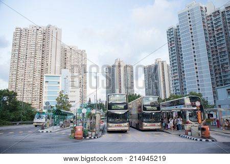 Tsing Yi Hong Kong- September 222017: Double decker bus park at Tsing Yi Bus station with resident building background.Tsing Yi Island is an island in the urban area of Hong Kong with an area of 10.69 sq.km