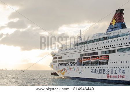 Hong Kong S.A.R.China - September 24 2017: Star Pisces of Star cruises ocean liners at ocean terminalTsim sha tsui Kowloon in sunset.Star Cruises is the third largest cruise line in the world
