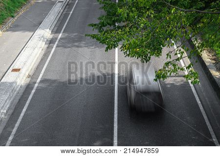 Motion blur of cars in aerial view over the road. (Speed limits - Infractions - Speed Camera)