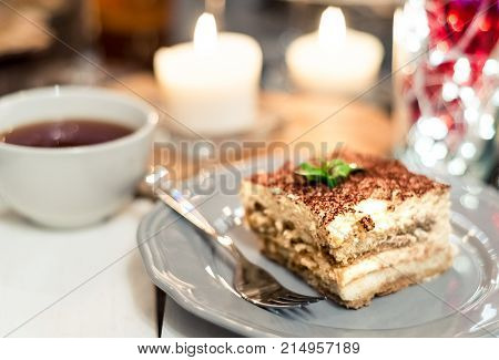Italian tiramisu dessert tiramisu dessert on a porcelain plate