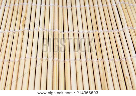 Wooden bamboo texture, sushi mat texture. Empty bamboo sushi mat background pattern japanese an chinese life style tradition. Texture background.