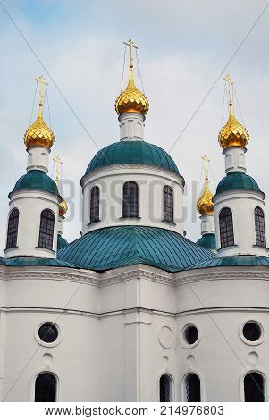 Monastery of the Epiphany in Uglich, Russia. Women's monastery. Blue sky with clouds background.