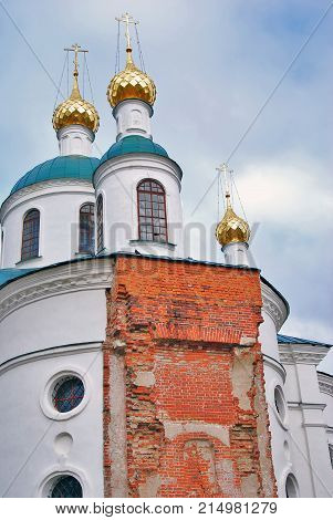 Monastery of the Epiphany in Uglich, Russia. Women's monastery. Blue sky with clouds background.