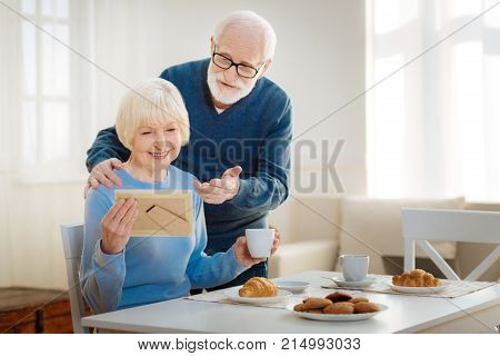 Just listen. Grandma holding photo of her children, granddad embracing his wife, consoling and becalming its