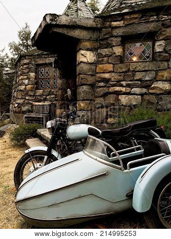 Osaka, Japan - FEB 12, 2017 : Hagrid's motorbike and background home Hagrid at Universal Studios Japan.The Harry Potter is famous themed attractions in the Universal Studios Japan Theme Park.