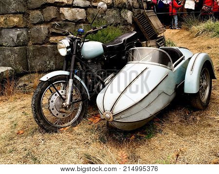 Osaka, Japan - FEB 12, 2017 : Hagrid's motorbike and background home Hagrid at Universal Studios Japan.The Harry Potter is famous themed attractions in the Universal Studios Japan Theme Park.