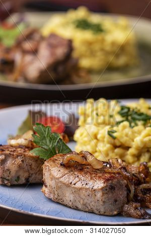 Roasted Pork Fillet And Spaetzle In A Plate