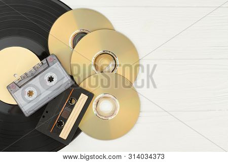 Vinyl Record, Tape Cassettes And Compact Discs. Dvd Discs, Audio Cassette Tapes, Gramophone Record A