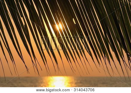Sunset on a beautiful tropical beach on Koh Chang island in Thailand
