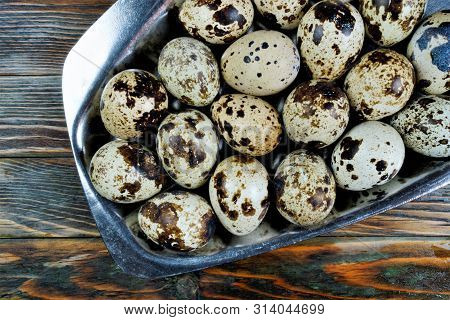 Quail Eggs Are A Food Product-- The Bird Partridge. The Egg Shape Is Oval, Brown Spotted Color, The 