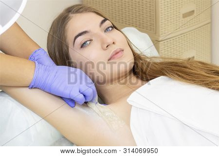 Sugaring: Epilation With Liquate Sugar At Armpit. Master Of Sugaring Making Hair Removal Procedure F