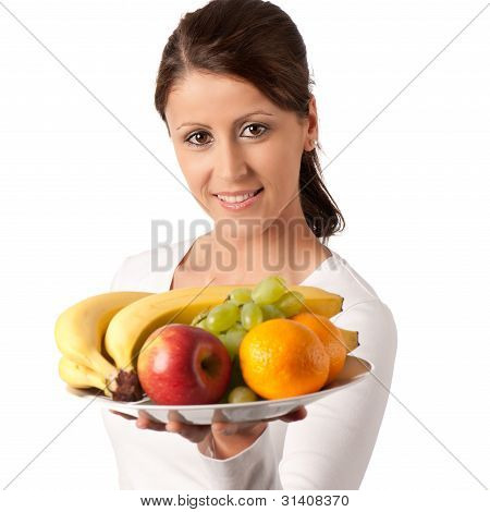 Attractive Young Woman With A Plate Of Different Fruits