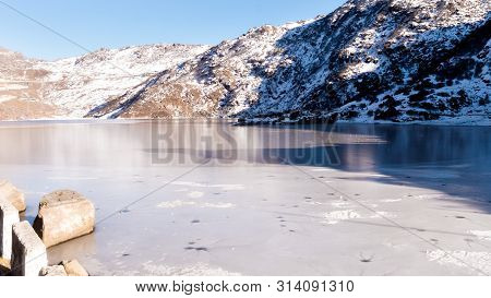 Tsomgo Lake (tsongmo Or Changu Lake) Frozen During Winter Season. It Is A Glacial Lake In East Gangt