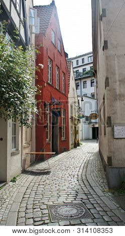 Bremen, Germany - 07 23 2015 - View Of Medieval Street Schnoor, Half-timbered Houses In The Centre O