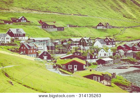 Bour Village. Typical Grass-roof Houses And Green Mountains. Vagar Island, Faroe Islands. Denmark. E