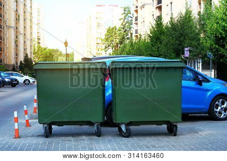 Dustbins Being Full With Garbage. Garbage Is Pile Lots Dump. Garbage Bins In Sunny City.