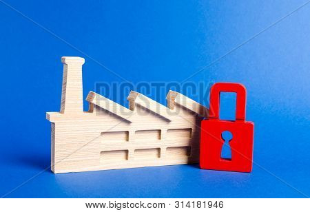Factory Figurine And Red Padlock. The Law On The Prohibition Of Placing Industrial Facilities, The C