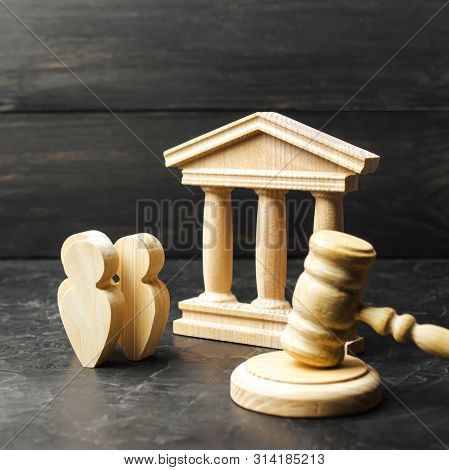 People Standing Near The House Of Government And Judge's Gavel. Concept Of The Judicial System And T