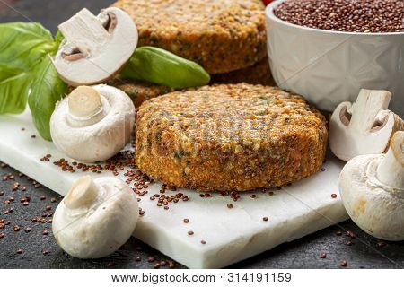 Tasty Vegetarian And Vegan Burgers Made From Healthy Quinoa, Basil, Tomatoes And Champignon Mushroom