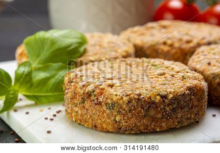 Tasty Vegetarian Burgers Made From Healthy Quinoa, Basil, Tomatoes And Mozzarella Cheese