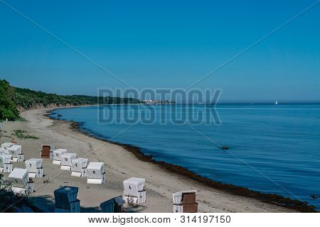 Beautiful White Sandy Beach With Roofed Wicker Chairs At The Baltic Sea Cost In Heiligendamm