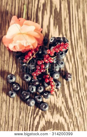 Beautiful Fragrant And Delicious Cyanococcus Berry On A Brown Background And A Beautiful Composition