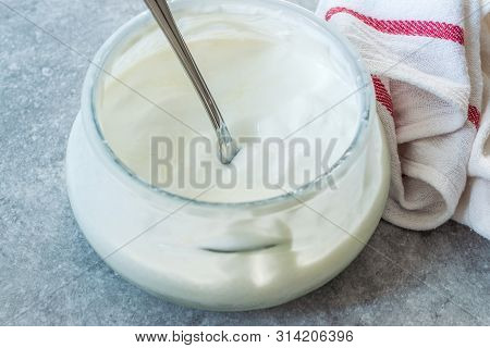 Homemade Goat Yogurt In Glass Bowl With Spoon / Probiotic Custard