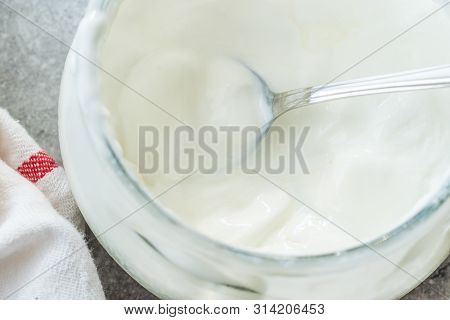 Homemade Goat Yogurt In Glass Bowl With Spoon / Probiotic Custard