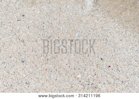 The View From The Top. Summer Beach, Sea Background Of Sand And Clear Water With Foam On The Ocean. 