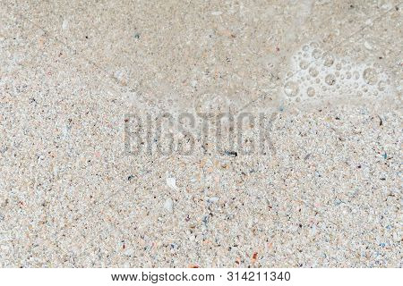 The View From The Top. Summer Beach, Sea Background Of Sand And Clear Water With Foam On The Ocean. 