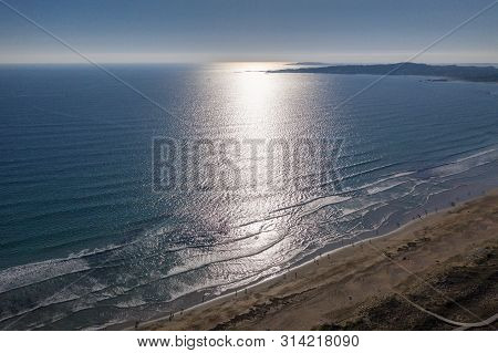 Ocean Waves, Sandy Beach With People Bathing In The Water, View From Drone, Lanzada Beach, Galicia,