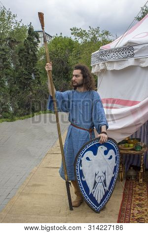 Moscow/ Russia - 15.06.2019: Ancient Historical Arab Warrior With A Shield And A Spear Near The Whit