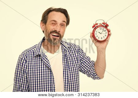 What Time Is It. Bearded Senior Man With Mechanical Clock In Hand. Mature Timekeeper With Analog Clo