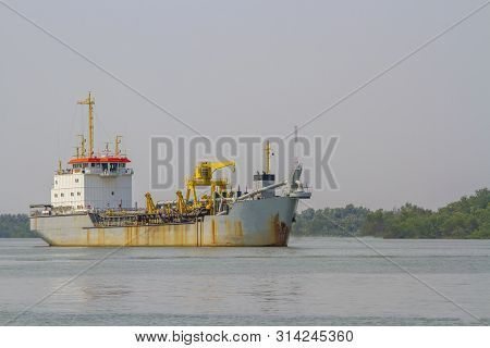 Old Cargo Ship Or Ferry On The Sea