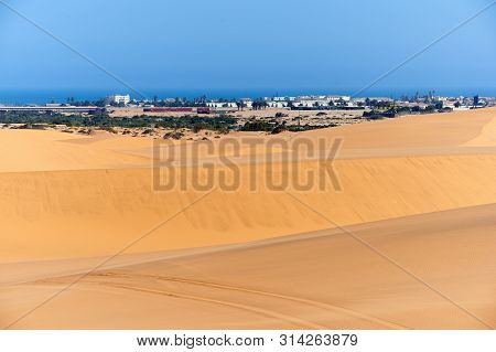 Swakopmund, A Town Along The Coast In Namibia, Located Between The Ocean And The Desert.