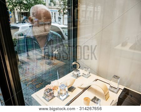 Baden-baden, Germany - Jul 7, 2019: Senior Caucasian Wealthy Man Looking At The Blancpain Luxury Wat