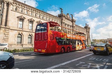 Barcelona, Spain - Jun 1, 2018: Full Barcelona City Tour Red Sightseeing Bus With Tourist In Front O