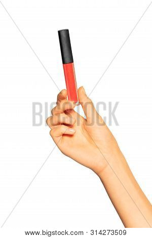 Female Hand Holding Tube With Liquid Lipstick
