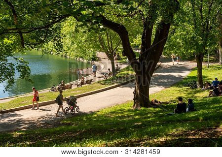 Montreal, Ca - 1 July 2019: People Enjoying A Warm Summer Day At The La Fontaine Park.