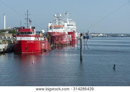 New Bedford, Massachusetts, Usa - July 29, 2019: Line Of Offshore Support Vessels Docked At The Mari