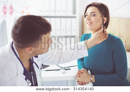 The Patient And His Doctor In Medical Office