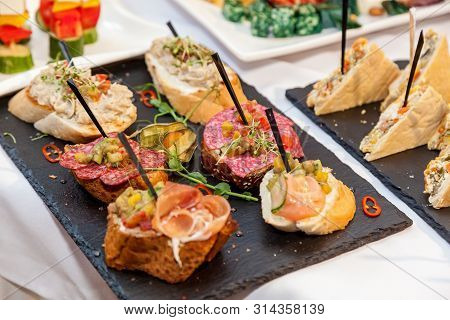 Beautifully Decorated Appetizers For The Catering Banquet Table