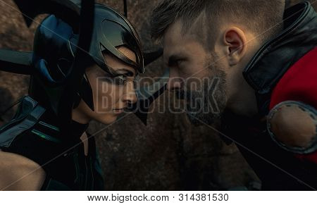 Dnipro, Ukraine- June 5, 2019: Cosplayers Portray Battle Of Goddess Of Death Hela And Superhero Thor