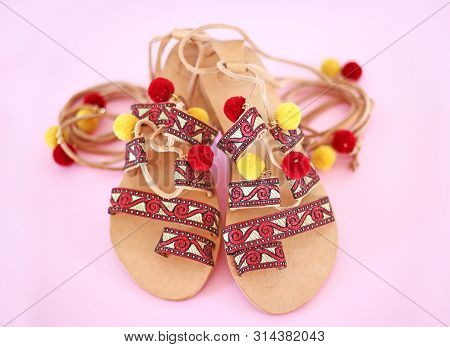Bohemian Leather Sandals With Red Tassel And Pom Pom - Gladiator Sandals - Pink Background