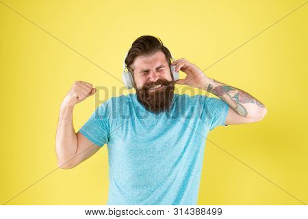 Wireless Headphones Deliver Clean Sound. Modern Technology. Bearded Man Listen Music Wireless Gadget