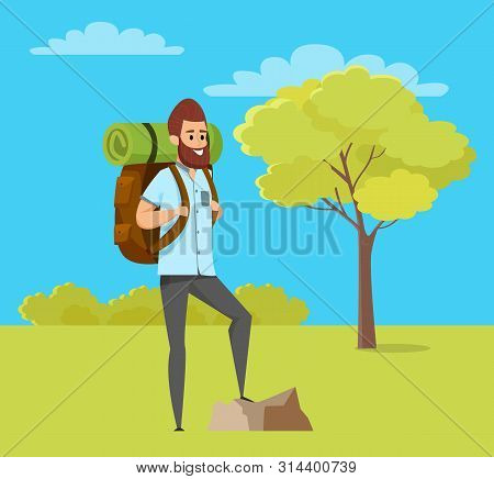 Hiker Wearing Casual Clothes And Backpack Standing Outdoor, Green Grass, Tree And Bush. Portrait Vie