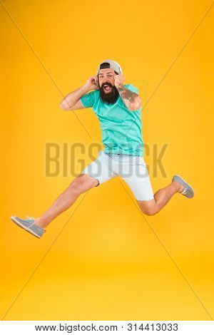Energy Of Rhythm. Hipster Dancing Jumping Headphones Gadget. Inspiring Song. Music Library. Music Fa