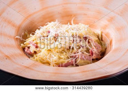 Gluten Free Spaghetti Pasta Alla Carbonara With With Bacon, Egg Yolk Served With Cheese Carbonara Sa