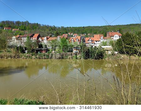 View Over The Werra River In Hann. Muenden, Germany To Blume District