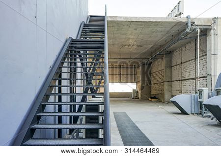 Industial Steel Stair At The Rooftop Building.